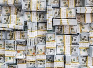 Dólar cai a R$ 5,14 com alívio no mercado externo